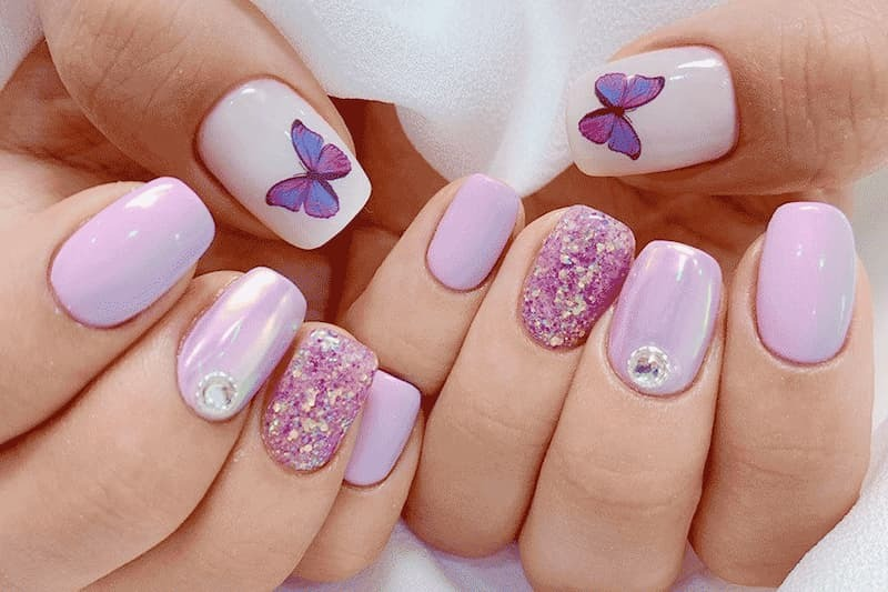 Mẫu nail tím pastel họa tiết bướm