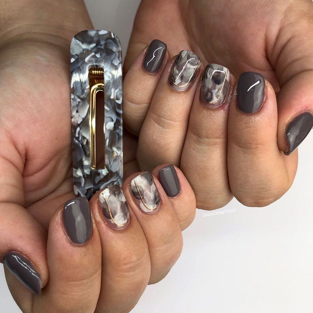 Mẫu nail mắt mèo màu đen nhạt độc đáo
