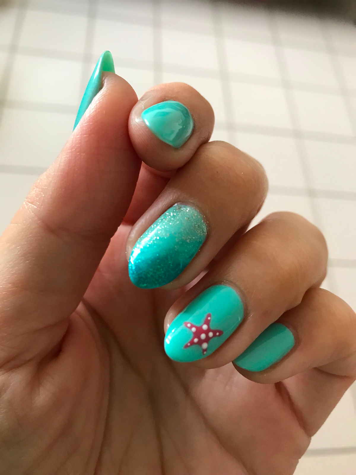 Nail xanh ngọc hoạ tiết sóng biển
