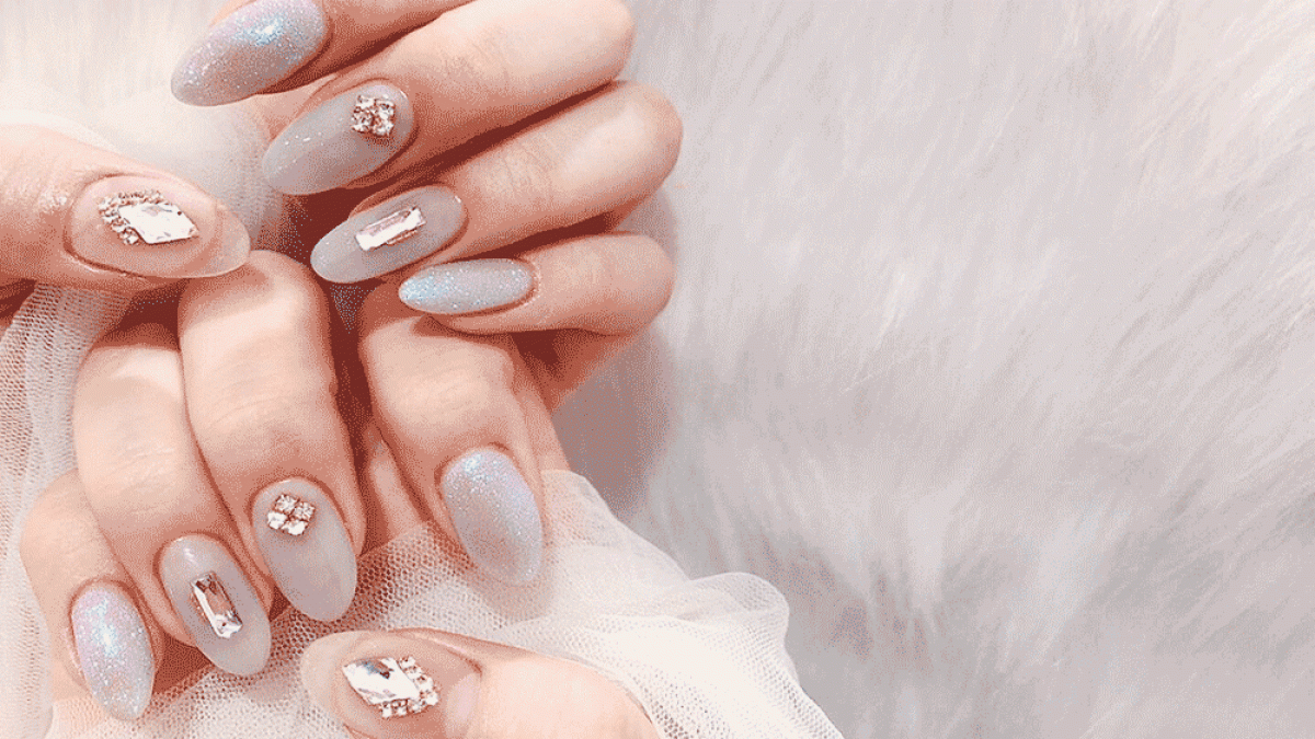 Mẫu nail mắt mèo kim cương dũa bầu nhọn đính đá