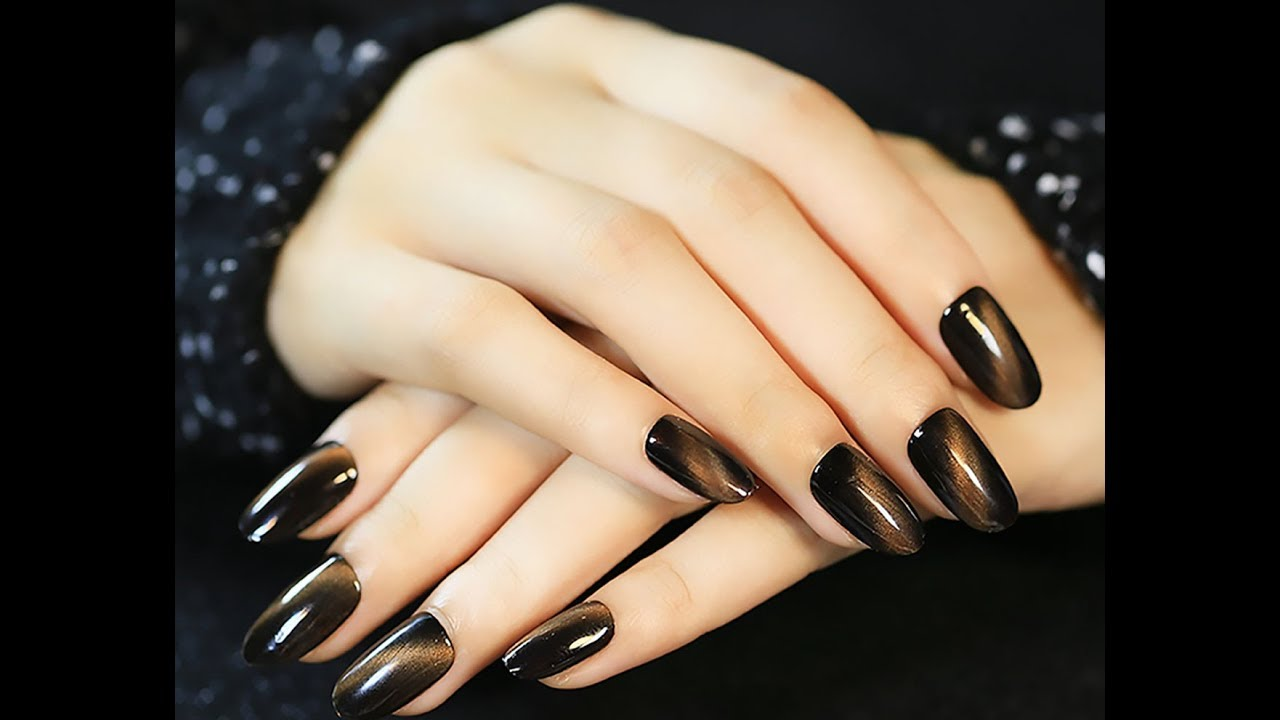 Mẫu nail mắt mèo kim cương màu đen huyền bí 