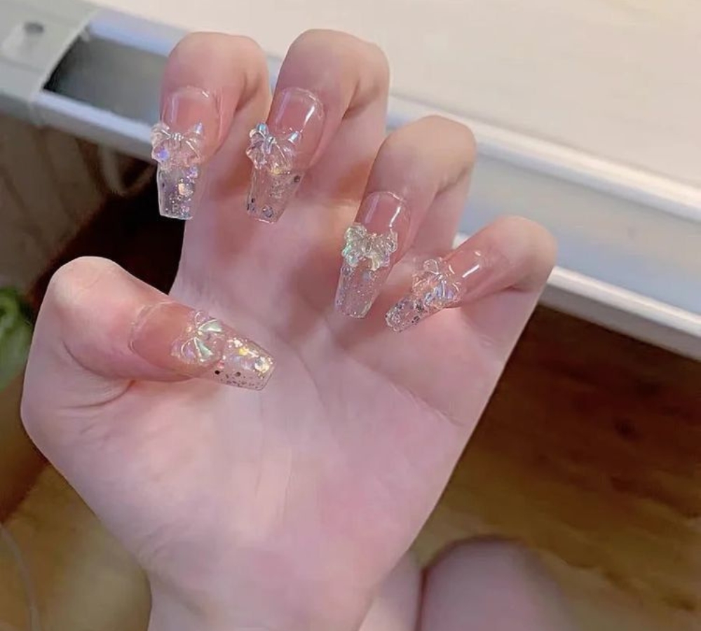 Mẫu nail hồng kết hợp đính nơ full ngón 