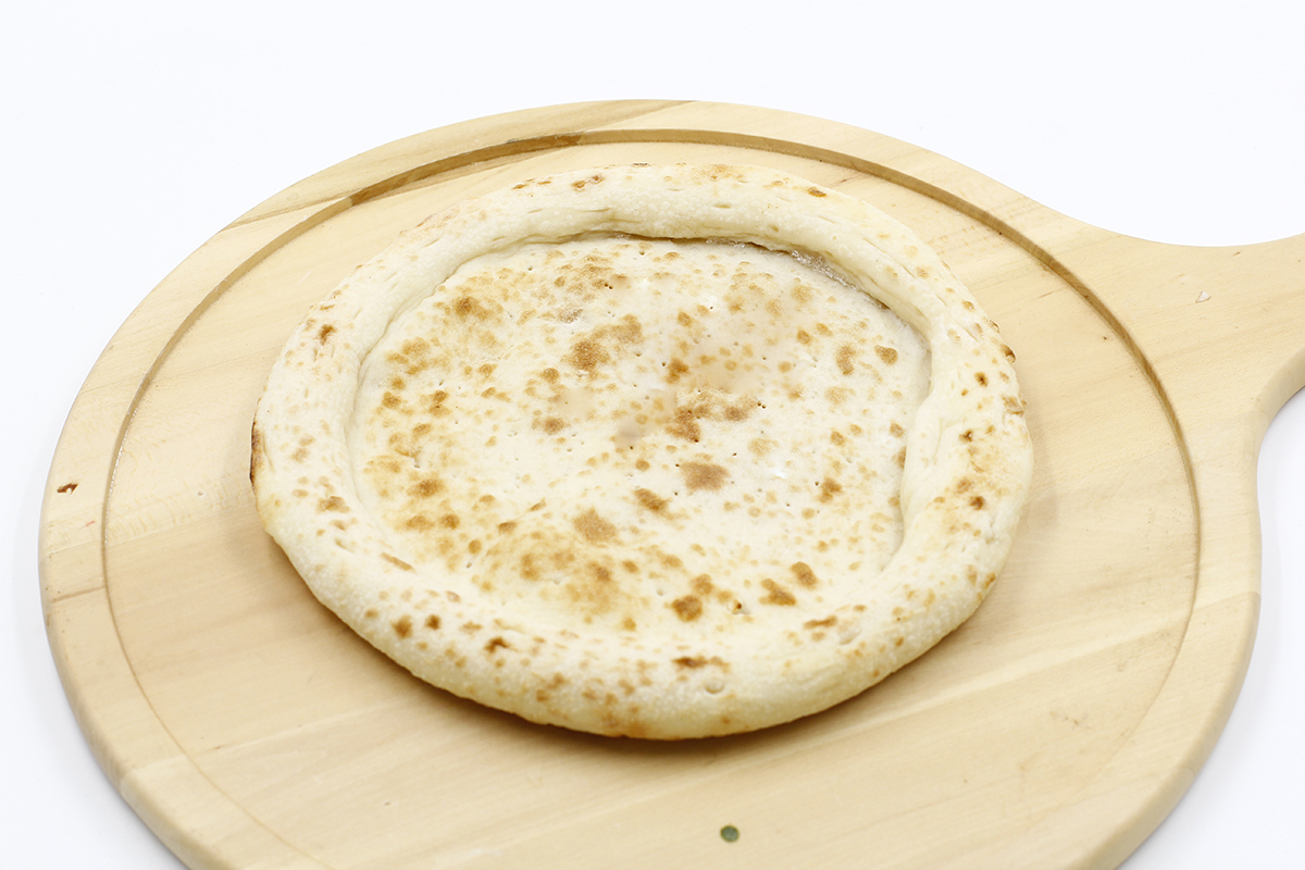Bí quyết thực hiện đế bánh Pizza nở xốp giản dị