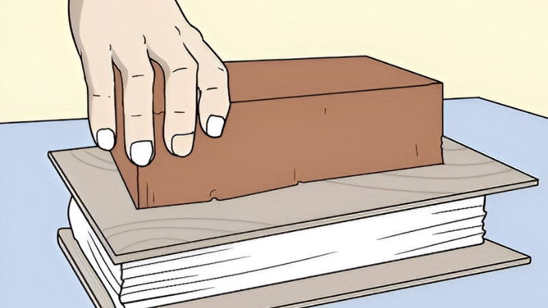 Cách làm phẳng trang sách bị nhăn, phồng rộp